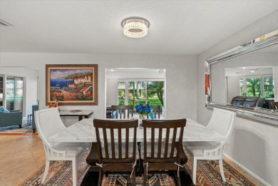 This beautifully renovated villa on a desirable corner lot in on Palm Aire Country Club of Sarasota in Florida - for sale on GolfHomes.com, golf home, golf lot