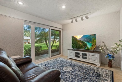This beautifully renovated villa on a desirable corner lot in on Palm Aire Country Club of Sarasota in Florida - for sale on GolfHomes.com, golf home, golf lot