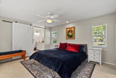 This beautifully renovated villa on a desirable corner lot in on Palm Aire Country Club of Sarasota in Florida - for sale on GolfHomes.com, golf home, golf lot