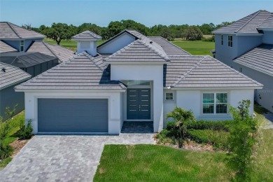 A true custom build ABD home looking across the 15th fairway at on Providence Golf Club in Florida - for sale on GolfHomes.com, golf home, golf lot