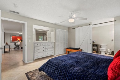 This beautifully renovated villa on a desirable corner lot in on Palm Aire Country Club of Sarasota in Florida - for sale on GolfHomes.com, golf home, golf lot