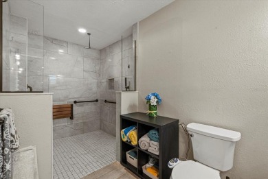 This beautifully renovated villa on a desirable corner lot in on Palm Aire Country Club of Sarasota in Florida - for sale on GolfHomes.com, golf home, golf lot