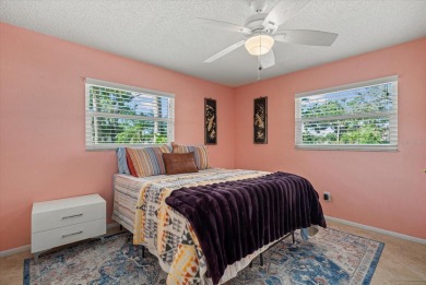 This beautifully renovated villa on a desirable corner lot in on Palm Aire Country Club of Sarasota in Florida - for sale on GolfHomes.com, golf home, golf lot