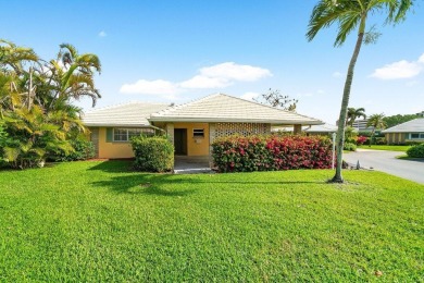Waterfront Gem with Unmatched Golf & Lake Views!Discover the on Atlantis Golf Club in Florida - for sale on GolfHomes.com, golf home, golf lot