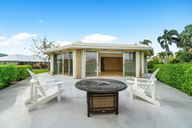 Waterfront Gem with Unmatched Golf & Lake Views!Discover the on Atlantis Golf Club in Florida - for sale on GolfHomes.com, golf home, golf lot
