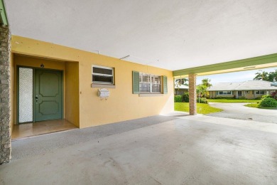 Waterfront Gem with Unmatched Golf & Lake Views!Discover the on Atlantis Golf Club in Florida - for sale on GolfHomes.com, golf home, golf lot