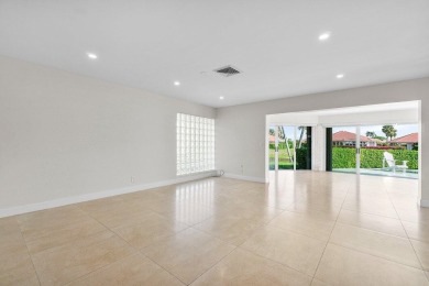 Waterfront Gem with Unmatched Golf & Lake Views!Discover the on Atlantis Golf Club in Florida - for sale on GolfHomes.com, golf home, golf lot