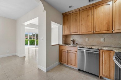 Waterfront Gem with Unmatched Golf & Lake Views!Discover the on Atlantis Golf Club in Florida - for sale on GolfHomes.com, golf home, golf lot