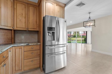 Waterfront Gem with Unmatched Golf & Lake Views!Discover the on Atlantis Golf Club in Florida - for sale on GolfHomes.com, golf home, golf lot