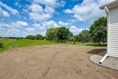 Situated just off of the 16th green of The Vintage Golf Course on Vintage Golf Course in Minnesota - for sale on GolfHomes.com, golf home, golf lot