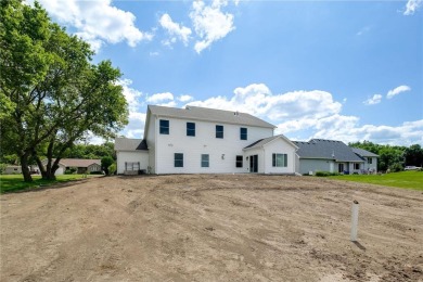 Situated just off of the 16th green of The Vintage Golf Course on Vintage Golf Course in Minnesota - for sale on GolfHomes.com, golf home, golf lot