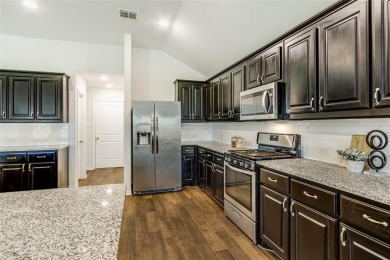 Welcome to this beautifully crafted single-story gem nestled in on Stone River Golf Club in Texas - for sale on GolfHomes.com, golf home, golf lot