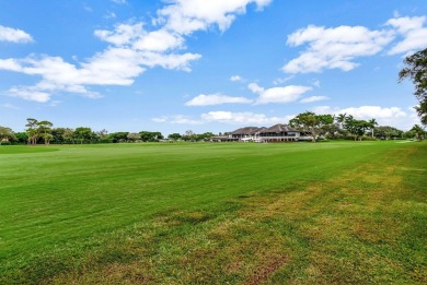 This beautifullyrenovated first-floor condo is nestled within on Seagate Country Club in Florida - for sale on GolfHomes.com, golf home, golf lot