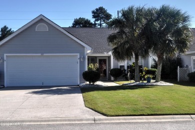 Welcome to this immaculate updated 3 bedroom home in Sunset on Sandpiper Bay Golf and Country Club in North Carolina - for sale on GolfHomes.com, golf home, golf lot