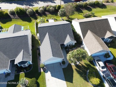 Welcome to this immaculate updated 3 bedroom home in Sunset on Sandpiper Bay Golf and Country Club in North Carolina - for sale on GolfHomes.com, golf home, golf lot