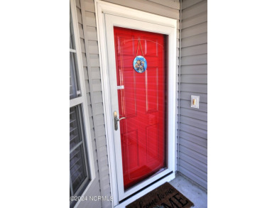 Welcome to this immaculate updated 3 bedroom home in Sunset on Sandpiper Bay Golf and Country Club in North Carolina - for sale on GolfHomes.com, golf home, golf lot