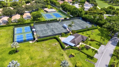 This beautifullyrenovated first-floor condo is nestled within on Seagate Country Club in Florida - for sale on GolfHomes.com, golf home, golf lot