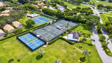 This beautifullyrenovated first-floor condo is nestled within on Seagate Country Club in Florida - for sale on GolfHomes.com, golf home, golf lot