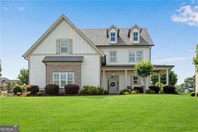 MUST SEE THIS STUNNING HOME Well maintained 5 bedroom , 3 1/2 on Traditions of Braselton Golf Club in Georgia - for sale on GolfHomes.com, golf home, golf lot