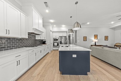 This stunning open ranch plan offers effortless, low-maintenance on Harbor Club Golf and Country Club in Georgia - for sale on GolfHomes.com, golf home, golf lot