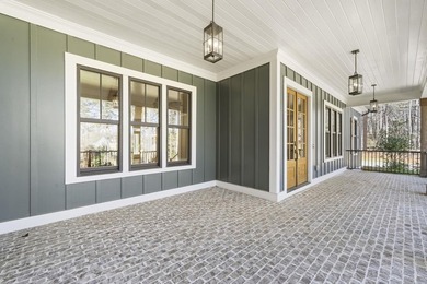 Like-new, immaculately maintained golf-course retreat -- on Harbor Club Golf and Country Club in Georgia - for sale on GolfHomes.com, golf home, golf lot