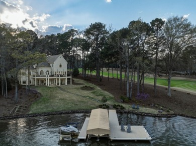 EXTRAORDINARY LAKEFRONT HOME IN GREAT WATERS, WITH EXPANSIVE on Great Waters Course At Reynolds Plantation in Georgia - for sale on GolfHomes.com, golf home, golf lot