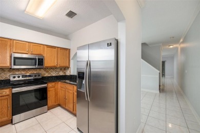 Welcome to this immaculately maintained, move-in ready home on Heritage Isles Golf and Country Club in Florida - for sale on GolfHomes.com, golf home, golf lot