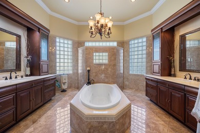 This majestic 6-bedroom plus office estate offers over 4,300 on Binks Forest Golf Club in Florida - for sale on GolfHomes.com, golf home, golf lot