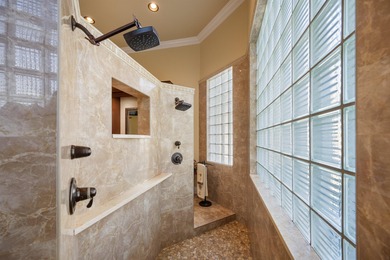 This majestic 6-bedroom plus office estate offers over 4,300 on Binks Forest Golf Club in Florida - for sale on GolfHomes.com, golf home, golf lot