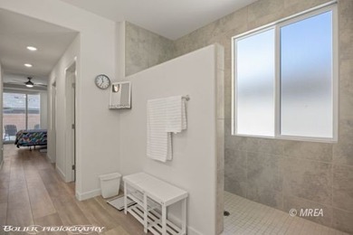 Built in 2023, this contemporary modern home in Montrose on Wolf Creek At Paradise Canyon in Nevada - for sale on GolfHomes.com, golf home, golf lot