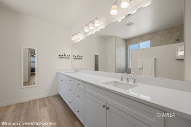 Built in 2023, this contemporary modern home in Montrose on Wolf Creek At Paradise Canyon in Nevada - for sale on GolfHomes.com, golf home, golf lot