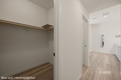 Built in 2023, this contemporary modern home in Montrose on Wolf Creek At Paradise Canyon in Nevada - for sale on GolfHomes.com, golf home, golf lot