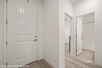 Built in 2023, this contemporary modern home in Montrose on Wolf Creek At Paradise Canyon in Nevada - for sale on GolfHomes.com, golf home, golf lot