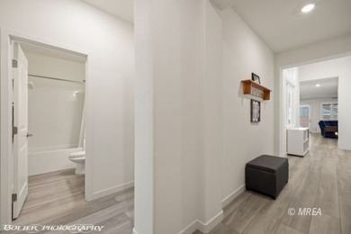 Built in 2023, this contemporary modern home in Montrose on Wolf Creek At Paradise Canyon in Nevada - for sale on GolfHomes.com, golf home, golf lot