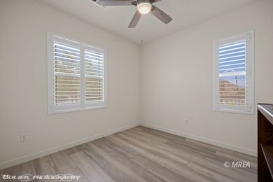 Built in 2023, this contemporary modern home in Montrose on Wolf Creek At Paradise Canyon in Nevada - for sale on GolfHomes.com, golf home, golf lot