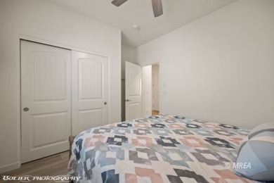 Built in 2023, this contemporary modern home in Montrose on Wolf Creek At Paradise Canyon in Nevada - for sale on GolfHomes.com, golf home, golf lot