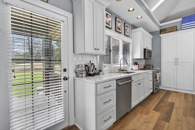 Lakefront Villa with Max Dock in Cuscowilla.  Enjoy spectacular on The Golf Club at Cuscowilla in Georgia - for sale on GolfHomes.com, golf home, golf lot