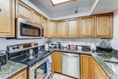 This beautifully updated 2 bedroom, 2 bathroom condo in on Feather Sound Country Club in Florida - for sale on GolfHomes.com, golf home, golf lot