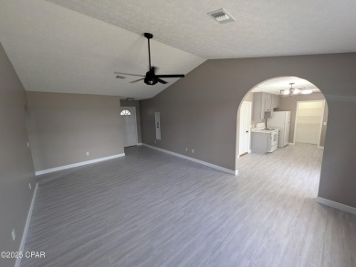 Discover coastal living at its finest in this charming, updated on Holiday Golf Club in Florida - for sale on GolfHomes.com, golf home, golf lot