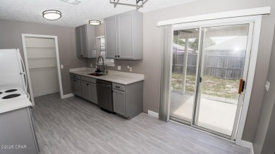 Discover coastal living at its finest in this charming, updated on Holiday Golf Club in Florida - for sale on GolfHomes.com, golf home, golf lot