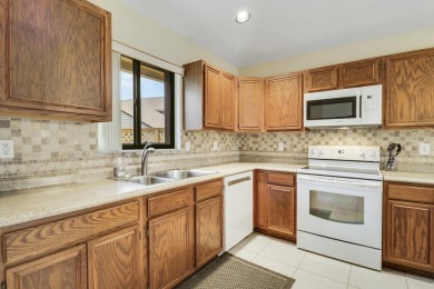 Lovely light and bright 2 bedroom, 2 bath villa with an on Heritage Ridge Golf Club in Florida - for sale on GolfHomes.com, golf home, golf lot