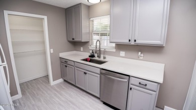 Discover coastal living at its finest in this charming, updated on Holiday Golf Club in Florida - for sale on GolfHomes.com, golf home, golf lot