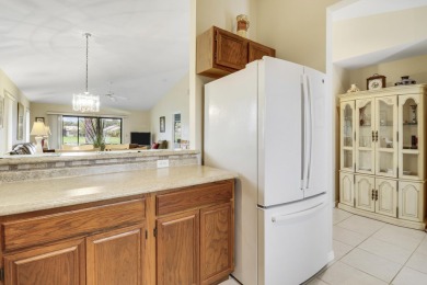 Lovely light and bright 2 bedroom, 2 bath villa with an on Heritage Ridge Golf Club in Florida - for sale on GolfHomes.com, golf home, golf lot