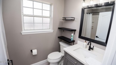 Discover coastal living at its finest in this charming, updated on Holiday Golf Club in Florida - for sale on GolfHomes.com, golf home, golf lot