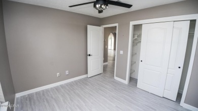 Discover coastal living at its finest in this charming, updated on Holiday Golf Club in Florida - for sale on GolfHomes.com, golf home, golf lot