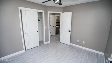 Discover coastal living at its finest in this charming, updated on Holiday Golf Club in Florida - for sale on GolfHomes.com, golf home, golf lot