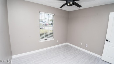 Discover coastal living at its finest in this charming, updated on Holiday Golf Club in Florida - for sale on GolfHomes.com, golf home, golf lot