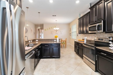 Stunning immaculately kept 3 bedroom 2 bath home.  Great room on Harmony Golf Preserve in Florida - for sale on GolfHomes.com, golf home, golf lot