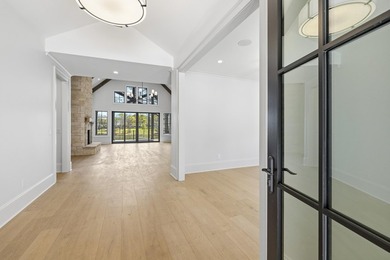 COMPLETELY RENOVATED. REIMAGINED. PRACTICALLY REBUILT FROM THE on Great Waters Course At Reynolds Plantation in Georgia - for sale on GolfHomes.com, golf home, golf lot