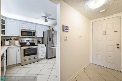 CORNER UNIT!  FIRST FLOOR.  55+ Community. This beautiful 2/2 on Inverrary Country Club in Florida - for sale on GolfHomes.com, golf home, golf lot